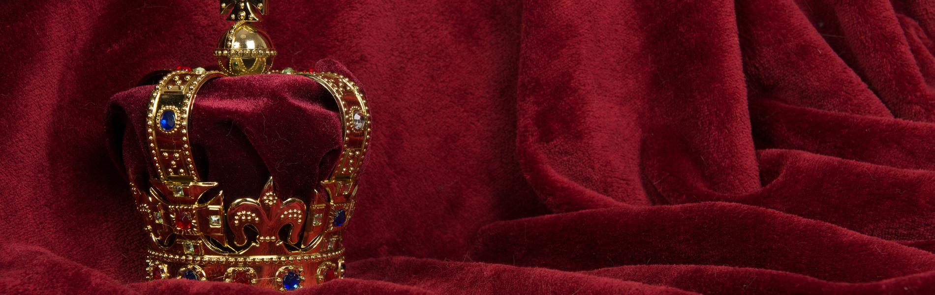 Crown on velvet drape