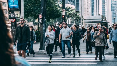 A group of people crossing a street